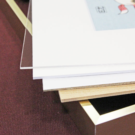 gold-colored aluminum frame