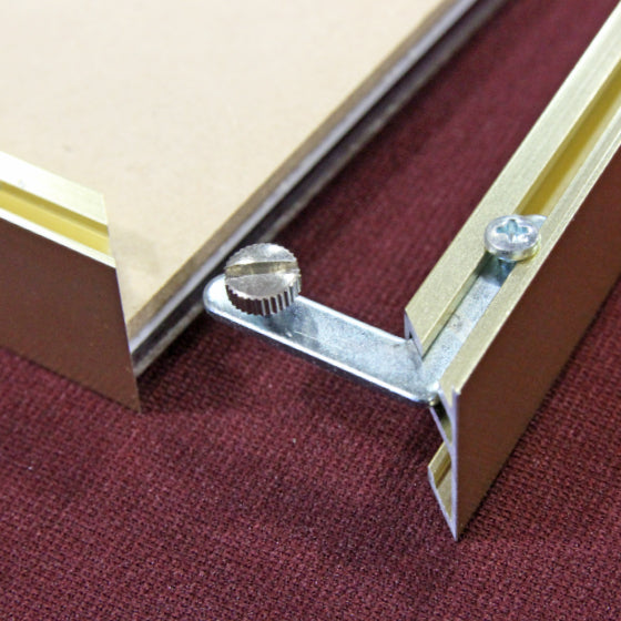 gold-colored aluminum frame